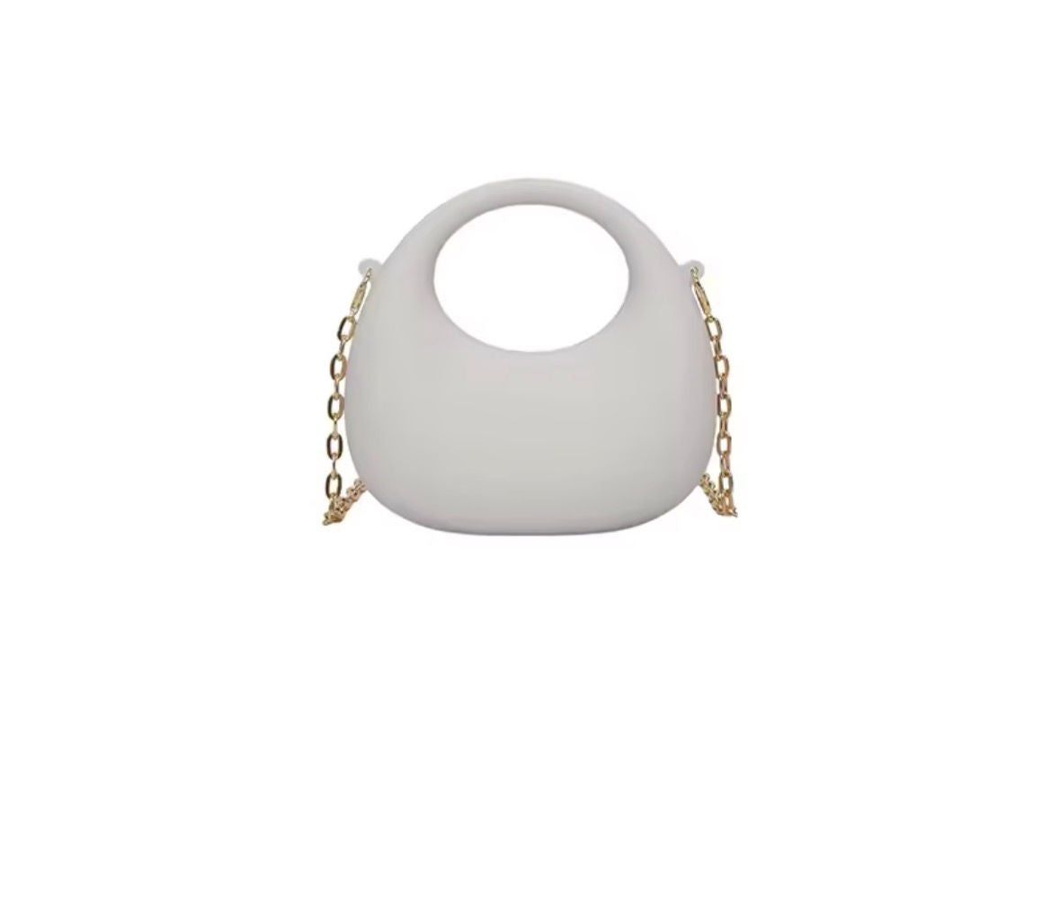 White handbag with gold chain strap on a white background