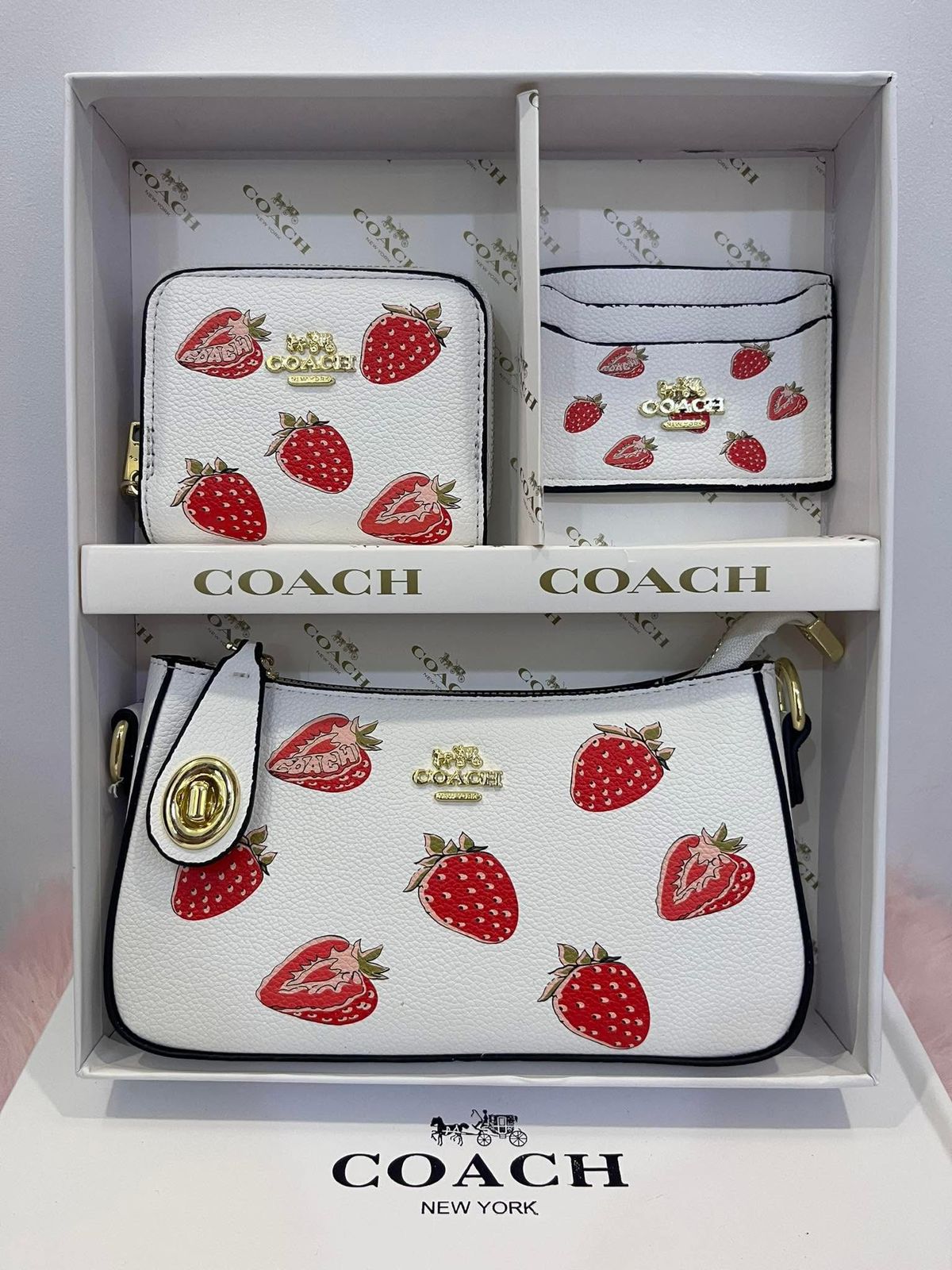 Coach wallet set with strawberry pattern in a box